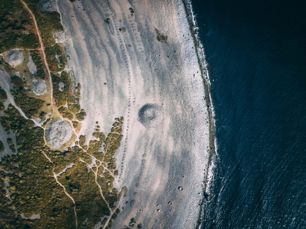 Photo: By Sindre Fs: https://www.pexels.com/photo/areal-photography-of-island-at-daytime-1106437/